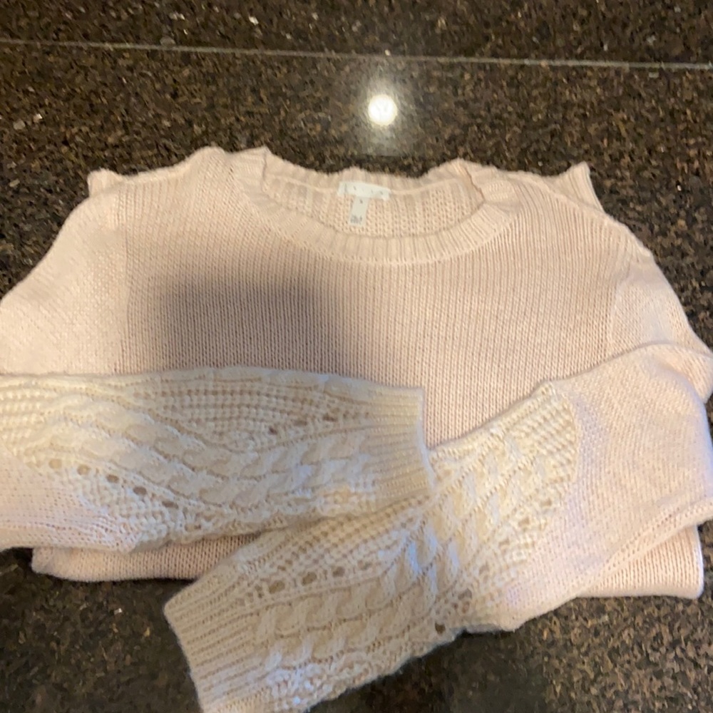 Long light soft pink sweater. Polyester and wool blend.